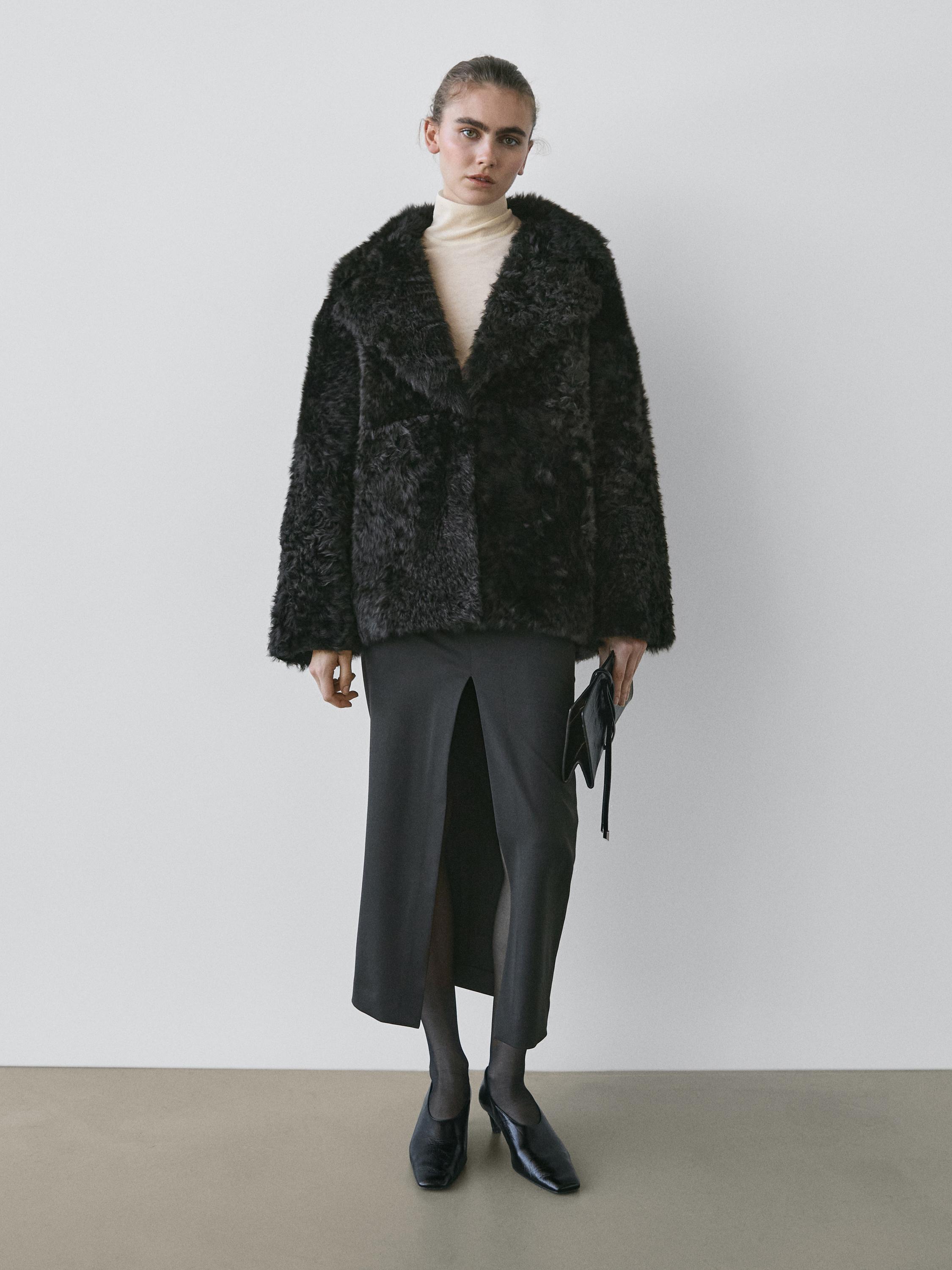 Sheepskin leather coat with lapel collar